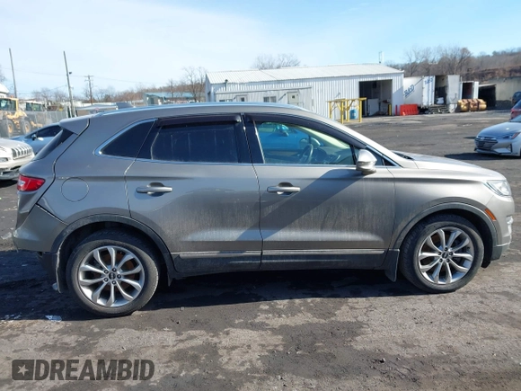 2016 Lincoln MKC Select with VIN 5LMCJ2D95GUJ08172, listed as a IAAI auction lot 41504279 with 73,425 mi miles and . Bid and sale history available at DreamBid. Image 13.