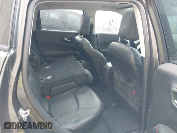 2017 Jeep Compass Trailhawk with VIN 3C4NJDDB9HT657173, listed as a IAAI auction lot 41613348 with 60,781 mi miles and . Bid and sale history available at DreamBid. Image 8.