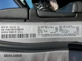 2021 Jeep Grand Cherokee 80th Anniversary with VIN 1C4RJFBG7MC665757, listed as a Copart auction lot 52443235 with 99,828 mi miles and Salvage Title. Bid and sale history available at DreamBid. Image 16.
