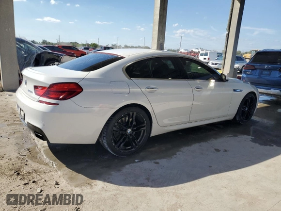 2013 BMW 6 Series 650i with VIN WBA6B2C52DD128713, listed as a Copart auction lot 47415235 with 123,575 mi miles and Clean Title. Bid and sale history available at DreamBid. Image 3.