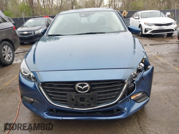 2018 Mazda 3 Touring with VIN 3MZBN1V35JM217641, listed as a IAAI auction lot 41943433 with 64,884 mi miles. Bid and sale history available at carsss.com. Image 12.