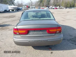 2000 Saturn SL z VIN 1G8ZK5275YZ244530, wystawiony jako IAAI lot #41784896 z przebiegiem 50 332 mil mil oraz . Historia ofert i sprzedaży dostępna na DreamBid. Obrazek 17.