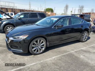 2018 Mazda 6 Grand Touring Reserve with VIN JM1GL1WY8J1300177, listed as a Copart auction lot 48551285 with 69,496 mi miles and Salvage Title. Bid and sale history available at carsss.com. Image 1.