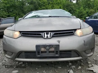 2006 Honda Civic Cpe LX with VIN 2HGFG12666H529570, listed as a Copart auction lot 63172594 with 220,481 mi miles and Salvage Title. Bid and sale history available at carsss.com. Image 5.