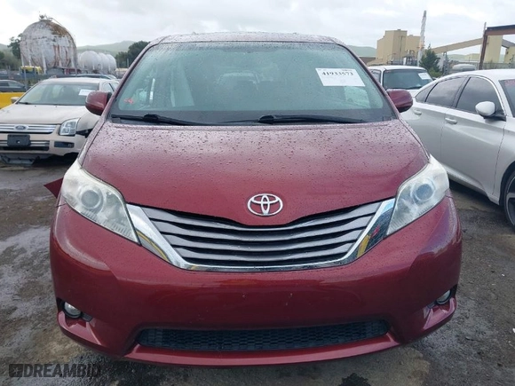 2016 Toyota Sienna XLE with VIN 5TDYK3DC5GS713664, listed as a IAAI auction lot 41933573 with 98,484 mi miles. Bid and sale history available at carsss.com. Image 13.