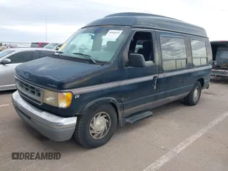 1997 Ford Econoline Commercial with VIN 1FDEE1460VHB16721, listed as a IAAI auction lot 40968310 with 261,169 mi miles. Bid and sale history available at carsss.com. Image 2.