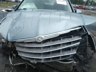 2009 Chrysler Sebring Touring z VIN 1C3LC56B89N517786, wystawiony jako IAAI lot #36918020 z przebiegiem 125 567 mil mil oraz . Historia ofert i sprzedaży dostępna na DreamBid. Obrazek 10.