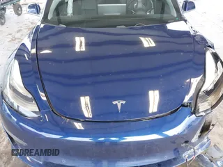2018 Tesla Model 3 Long Range Battery z VIN 5YJ3E1EA7JF035949, wystawiony jako IAAI lot #41627027 z przebiegiem Nie podano mil oraz . Historia ofert i sprzedaży dostępna na DreamBid. Obrazek 10.