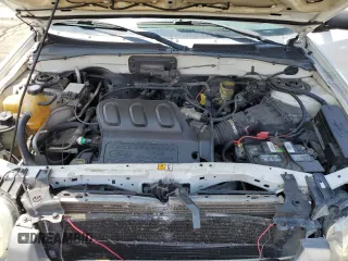 2004 Ford Escape XLS with VIN 1FMCU92114DA15564, listed as a Copart auction lot 59358015 with 186,135 mi miles and Salvage title. Bid and sale history available at DreamBid. Image 12.
