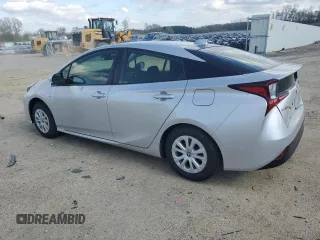 2021 Toyota Prius L Eco with VIN JTDKAMFU1M3142143, listed as a Copart auction lot 55662845 with 96,422 mi miles and Salvage Title. Bid and sale history available at DreamBid. Image 2.