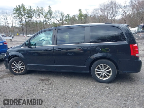 2019 Dodge Grand Caravan SXT with VIN 2C4RDGCG9KR804867, listed as a IAAI auction lot 42032311 with 157,351 mi miles and . Bid and sale history available at DreamBid. Image 14.