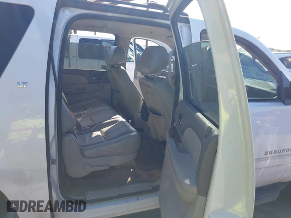 2011 Chevrolet Suburban LT with VIN 1GNSCJE06BR309881, listed as a IAAI auction lot 42577452 with 254,073 mi miles and . Bid and sale history available at DreamBid. Image 8.