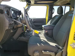 2024 Jeep Wrangler Rubicon z VIN 1C4RJXR64RW193946, wystawiony jako Copart lot #51693105 z przebiegiem 4 863 mil mil oraz Szkoda całkowita • Salvage title. Historia ofert i sprzedaży dostępna na DreamBid. Obrazek 7.