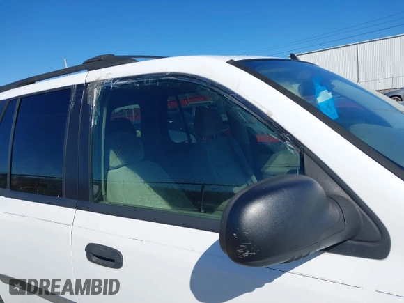 2007 GMC Envoy SLE with VIN 1GKDS13S772142847, listed as a IAAI auction lot 41605904 with 131,564 mi miles. Bid and sale history available at carsss.com. Image 12.