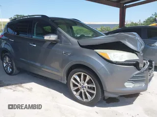 2014 Ford Escape SE z VIN 1FMCU0G97EUE34174, wystawiony jako IAAI lot #42274846 z przebiegiem 121 801 mil mil oraz . Historia ofert i sprzedaży dostępna na DreamBid. Obrazek 1.