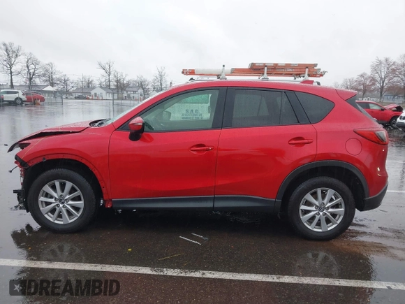 2015 Mazda CX-5 Touring with VIN JM3KE4CY3F0529669, listed as a IAAI auction lot 41866873 with 137,635 mi miles and . Bid and sale history available at carsss.com. Image 14.