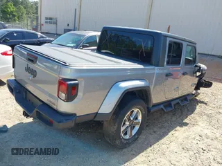 2021 Jeep Gladiator Willys z VIN 1C6HJTAG6ML507039, wystawiony jako IAAI lot #42057637 z przebiegiem 69 443 mil mil oraz . Historia ofert i sprzedaży dostępna na DreamBid. Obrazek 4.