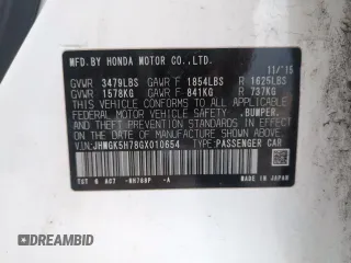 2016 Honda Fit EX with VIN JHMGK5H78GX010654, listed as a Copart auction lot 60937685 with 143,433 mi miles and Salvage title. Bid and sale history available at DreamBid. Image 13.