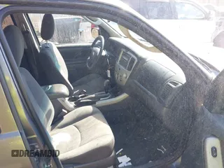 2006 Mazda Tribute i with VIN 4F2YZ92Z16KM25216, listed as a IAAI auction lot 41664006 with 228,222 mi miles and . Bid and sale history available at carsss.com. Image 5.