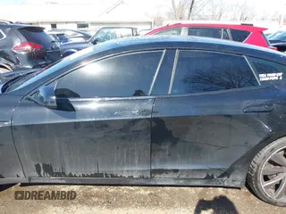 2014 Tesla Model S 60 with VIN 5YJSA1H1XEFP34226, listed as a IAAI auction lot 41806604 with 216,021 mi miles and . Bid and sale history available at DreamBid. Image 14.