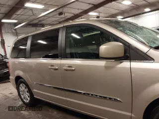2014 Chrysler Town & Country Touring with VIN 2C4RC1BG3ER295722, listed as a IAAI auction lot 41705820 with 142,587 mi miles and . Bid and sale history available at DreamBid. Image 14.