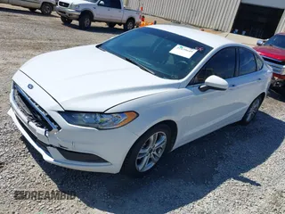 2018 Ford Fusion SE z VIN 3FA6P0H77JR142828, wystawiony jako IAAI lot #41820649 z przebiegiem 208 517 mil mil oraz . Historia ofert i sprzedaży dostępna na DreamBid. Obrazek 2.