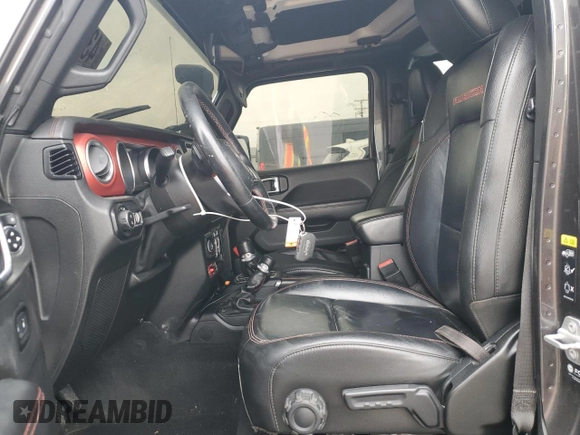 2021 Jeep Gladiator Rubicon with VIN 1C6JJTBG9ML512347, listed as a Copart auction lot 43197415 with 134,608 mi miles and Salvage title. Bid and sale history available at DreamBid. Image 7.