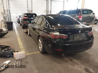 2014 BMW 3 Series 328d xDrive with VIN WBA3D5C58EKX95300, listed as a IAAI auction lot 41539957 with 133,382 mi miles. Bid and sale history available at carsss.com. Image 3.