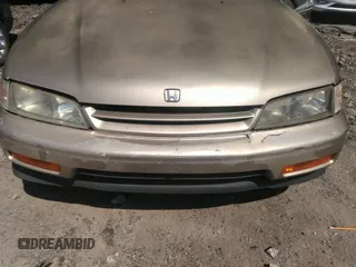 1994 Honda Accord LX with VIN 1HGCD5636RA020200, listed as a IAAI auction lot 40056997 with 212,810 mi miles. Bid and sale history available at carsss.com. Image 6.