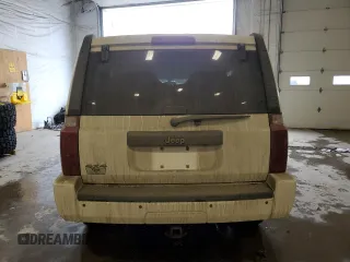 2010 Jeep Commander Sport z VIN 1J4RG4GK2AC158450, wystawiony jako Copart lot #46210865 z przebiegiem 222 500 mil mil oraz Szkoda całkowita • Salvage title. Historia ofert i sprzedaży dostępna na DreamBid. Obrazek 6.