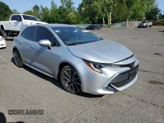 2019 Toyota Corolla Hatchback SE with VIN JTNK4RBE1K3012911, listed as a Copart auction lot 63495504 with 33,589 mi miles and Salvage Title. Bid and sale history available at carsss.com. Image 4.