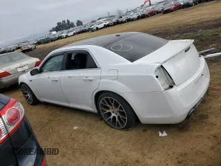 2013 Chrysler 300 SRT-8 with VIN 2C3CCAFJ7DH567824, listed as a Copart auction lot 89155475 with 147,159 mi miles and Salvage Title. Bid and sale history available at DreamBid. Image 2.