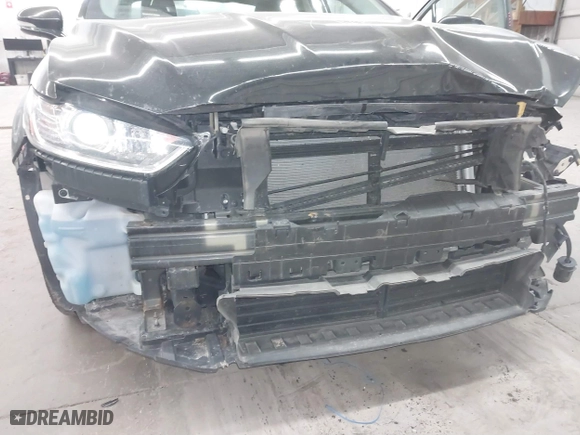 2015 Ford Fusion Titanium Hybrid with VIN 3FA6P0RU2FR309074, listed as a IAAI auction lot 41240630 with 172,025 mi miles. Bid and sale history available at carsss.com. Image 18.