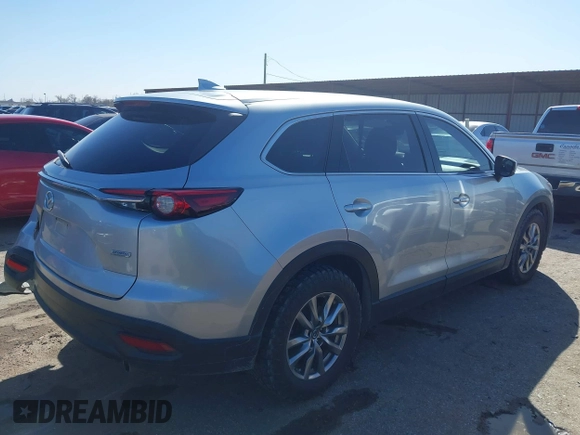 2018 Mazda CX-9 Touring with VIN JM3TCACY9J0219396, listed as a IAAI auction lot 41700710 with 123,383 mi miles and . Bid and sale history available at carsss.com. Image 4.