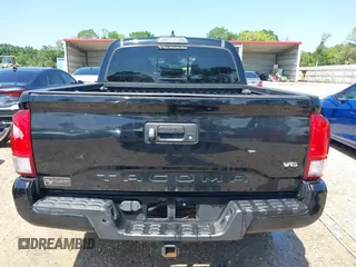 2017 Toyota Tacoma SR5 z VIN 5TFAZ5CNXHX048879, wystawiony jako IAAI lot #42157227 z przebiegiem 119 932 mil mil oraz . Historia ofert i sprzedaży dostępna na DreamBid. Obrazek 16.