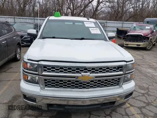 2015 Chevrolet Silverado 1500 LT with VIN 1GCNKRECXFZ414527, listed as a IAAI auction lot 41024683 with 219,673 mi miles. Bid and sale history available at carsss.com. Image 12.
