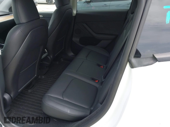 2023 Tesla Model Y Long Range z VIN 7SAYGDEE0PA065534, wystawiony jako IAAI lot #42445868 z przebiegiem 22 638 mil mil oraz . Historia ofert i sprzedaży dostępna na DreamBid. Obrazek 8.