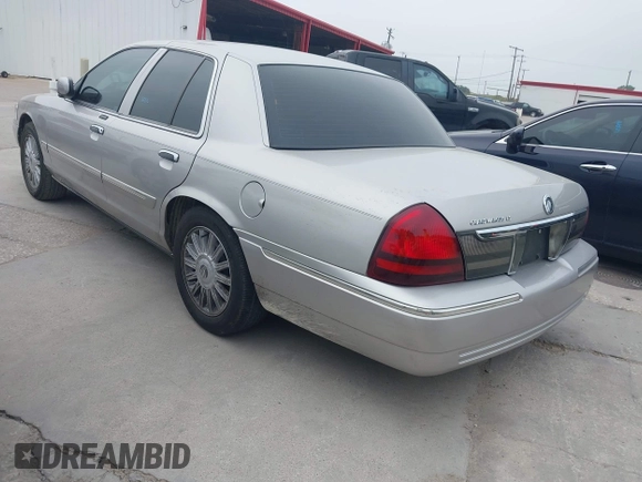 2008 Mercury Grand Marquis LS z VIN 2MEFM75V58X635416, wystawiony jako IAAI lot #42293676 z przebiegiem 118 838 mil mil oraz . Historia ofert i sprzedaży dostępna na DreamBid. Obrazek 3.