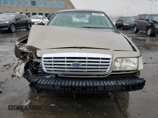 2005 Ford Crown Victoria LX z VIN 2FAFP74W05X122403, wystawiony jako Copart lot #45305825 z przebiegiem 202 381 mil mil oraz Szkoda całkowita • Salvage title. Historia ofert i sprzedaży dostępna na DreamBid. Obrazek 5.