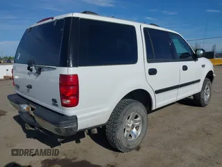 1999 Ford Expedition XLT z VIN 1FMPU18L0XLB52467, wystawiony jako IAAI lot #42018037 z przebiegiem 288 327 mil mil oraz . Historia ofert i sprzedaży dostępna na DreamBid. Obrazek 4.