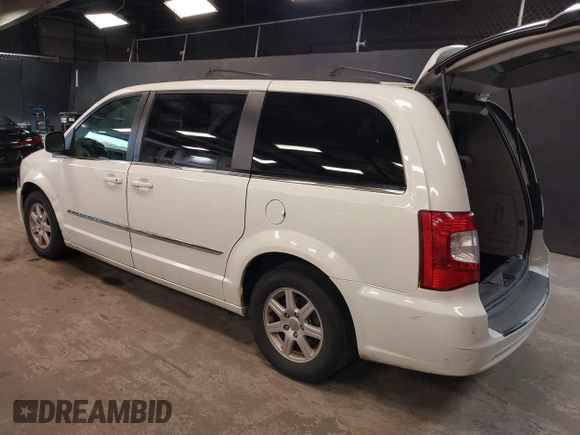 2013 Chrysler Town & Country Touring z VIN 2C4RC1BG9DR656630, wystawiony jako IAAI lot #42141980 z przebiegiem 150 303 mil mil oraz . Historia ofert i sprzedaży dostępna na DreamBid. Obrazek 3.