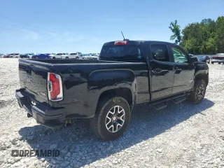 2015 GMC Canyon 4WD SLE with VIN 1GTG6BE32F1115990, listed as a Copart auction lot 71295314 with 118,913 mi miles and Salvage Title. Bid and sale history available at carsss.com. Image 5.