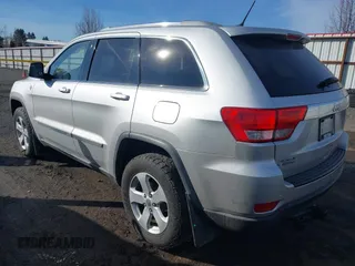 2011 Jeep Grand Cherokee 70th Anniversary with VIN 1J4RR4GTXBC718994, listed as a IAAI auction lot 41688158 with 121,680 mi miles. Bid and sale history available at carsss.com. Image 3.