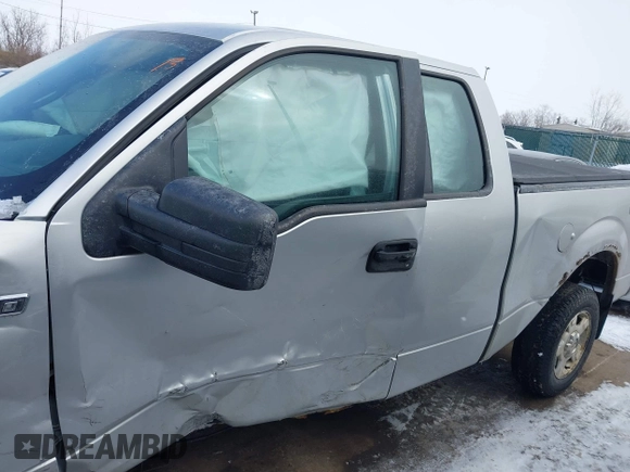 2014 Ford F-150 XL with VIN 1FTEX1EM2EFC66630, listed as a IAAI auction lot 41621780 with 169,624 mi miles and . Bid and sale history available at carsss.com. Image 14.