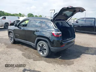 2021 Jeep Compass Altitude with VIN 3C4NJCBB0MT502423, listed as a IAAI auction lot 42006742 with 63,418 mi miles. Bid and sale history available at carsss.com. Image 3.