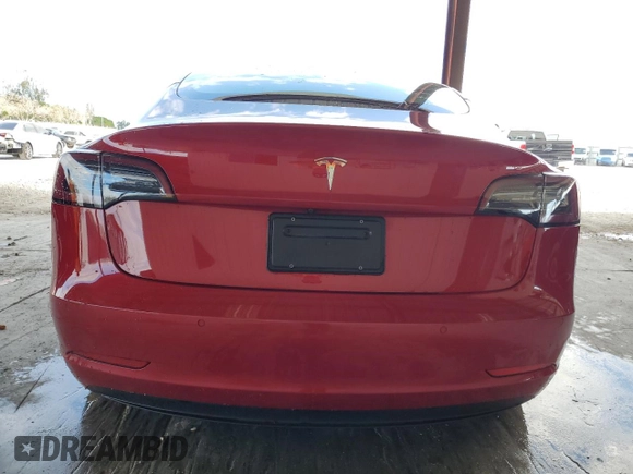 2022 Tesla Model 3 with VIN 5YJ3E1EA0NF329568, listed as a Copart auction lot 52594205 with 27,446 mi miles and Non Repairable. Bid and sale history available at carsss.com. Image 6.