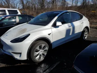 2023 Tesla Model Y Long Range with VIN 7SAYGDEE5PF785124, listed as a Copart auction lot 47072345 with 31,341 mi miles and Salvage Title. Bid and sale history available at DreamBid. Image 1.
