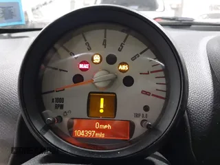 2012 MINI Countryman S with VIN WMWZC5C58CWL60067, listed as a IAAI auction lot 42081725 with 104,397 mi miles and . Bid and sale history available at DreamBid. Image 7.