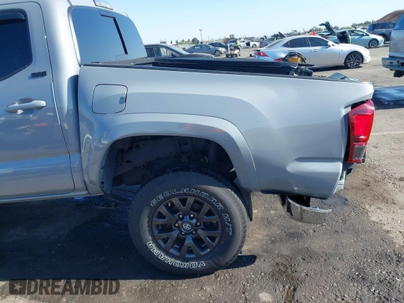 2021 Toyota Tacoma SR5 with VIN 5TFAZ5CN7MX101810, listed as a IAAI auction lot 42454418 with 58,930 mi miles and . Bid and sale history available at DreamBid. Image 18.