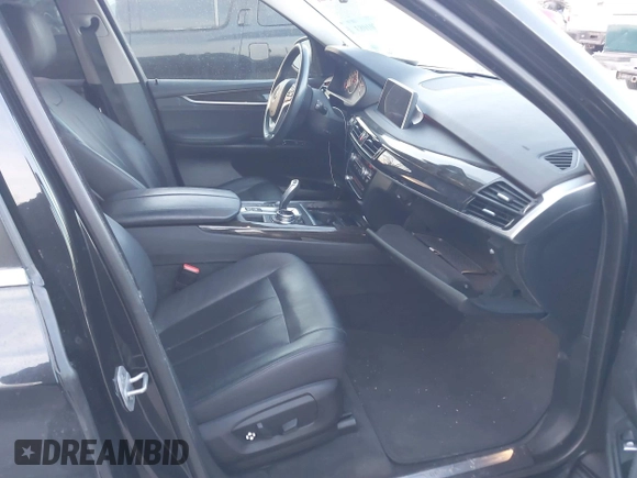2015 BMW X5 xDrive35i with VIN 5UXKR0C59F0K59728, listed as a IAAI auction lot 41701083 with 83,267 mi miles. Bid and sale history available at carsss.com. Image 5.